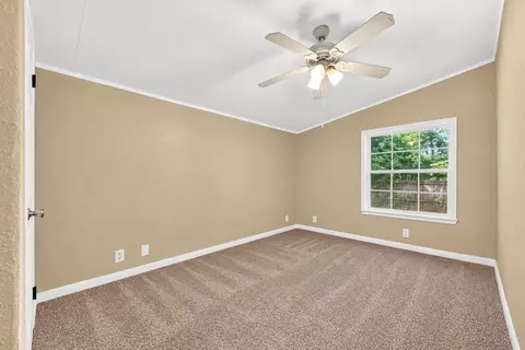 Bedroom - 16396 Red Tail Hawk Ct, Conroe, TX 77302 photo 3 of 6