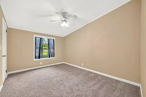 Bedroom - 16396 Red Tail Hawk Ct, Conroe, TX 77302 photo 4 of 6