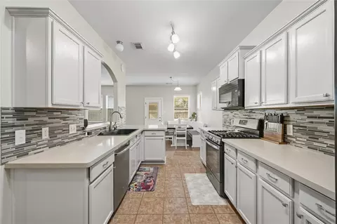 Kitchen - 7043 Windy Run Ct, Spring, TX 77379 photo 3 of 4
