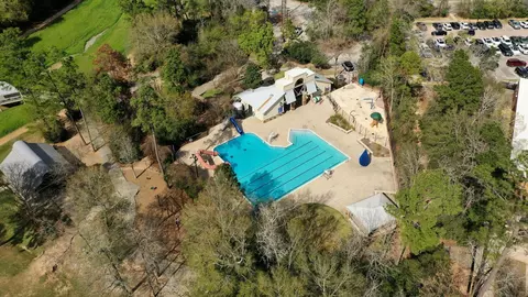 Exterior - 74 E Lakeridge Dr, The Woodlands, TX 77381 photo 7 of 7