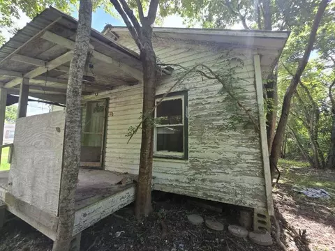 Exterior - 203 Cedar Cir, Daisetta, TX 77533 photo 2 of 7