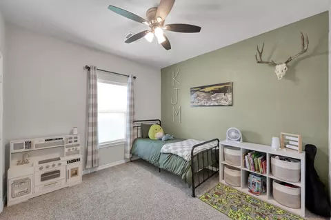 Bedroom - 12426 Hackberry Dr, Willis, TX 77318 photo 8 of 9