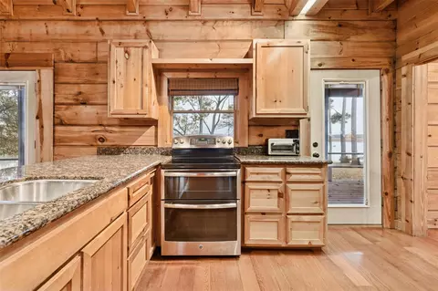 Kitchen - 384 Lonesome Dove Trl, Trinity, TX 75862 photo 2 of 3