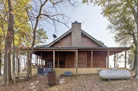 Exterior - 384 Lonesome Dove Trl, Trinity, TX 75862 photo 7 of 11