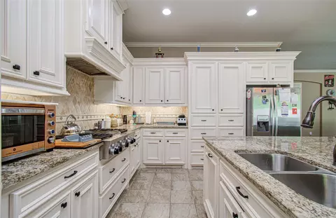 Kitchen - 314 Martin Luther King St S, Ames, TX 77575 photo 4 of 7