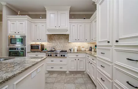 Kitchen - 314 Martin Luther King St S, Ames, TX 77575 photo 3 of 7