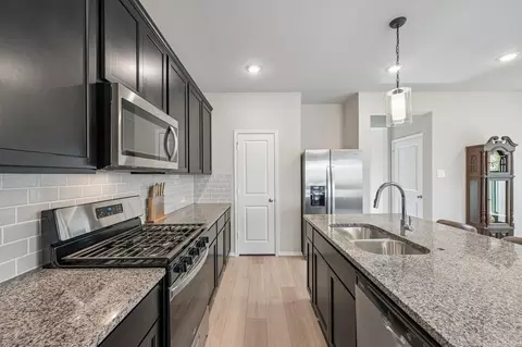 Kitchen - 31840 Pecan Cottage Ln, Spring, TX 77386 photo 4 of 5