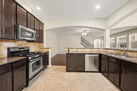 Kitchen - 8433 Sunset Loch Dr, Spring, TX 77379 photo 2 of 2