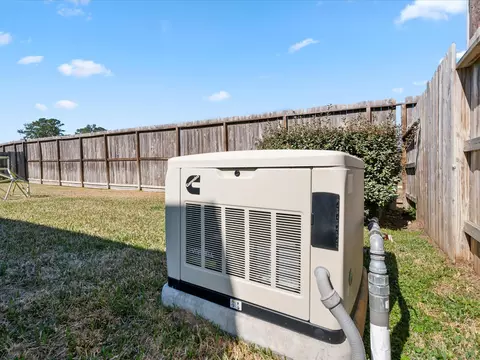 Exterior - 605 Ashbrook Ridge Ln, Pinehurst, TX 77362 photo 8 of 10