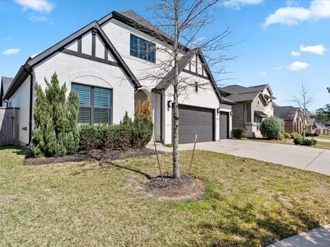 Exterior - 605 Ashbrook Ridge Ln, Pinehurst, TX 77362 photo 4 of 10