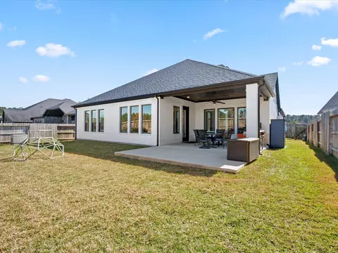 Exterior - 605 Ashbrook Ridge Ln, Pinehurst, TX 77362 photo 6 of 10