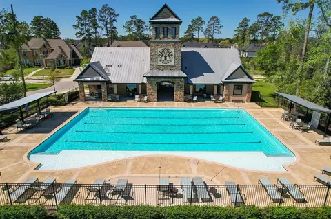Exterior - 605 Ashbrook Ridge Ln, Pinehurst, TX 77362 photo 9 of 10
