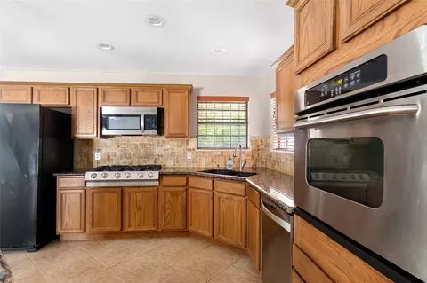 Kitchen - 1300 Smith Rd, Huffman, TX 77336 photo 3 of 3