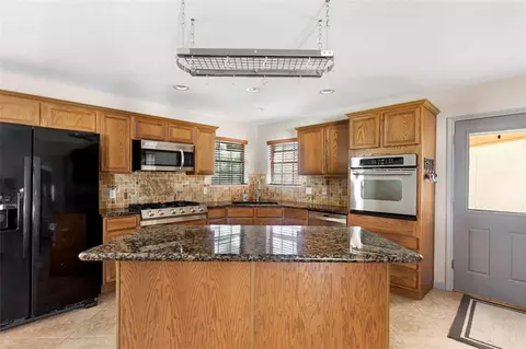 Kitchen - 1300 Smith Rd, Huffman, TX 77336 photo 1 of 3