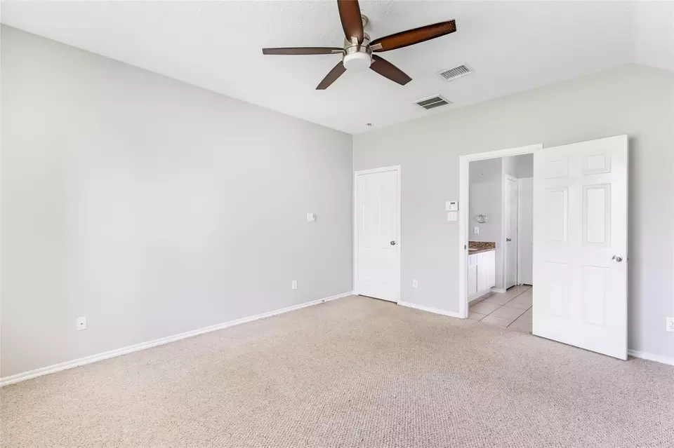 Bedroom - 7126 Leens Lodge Ln, Humble, TX 77346 photo 2 of 6
