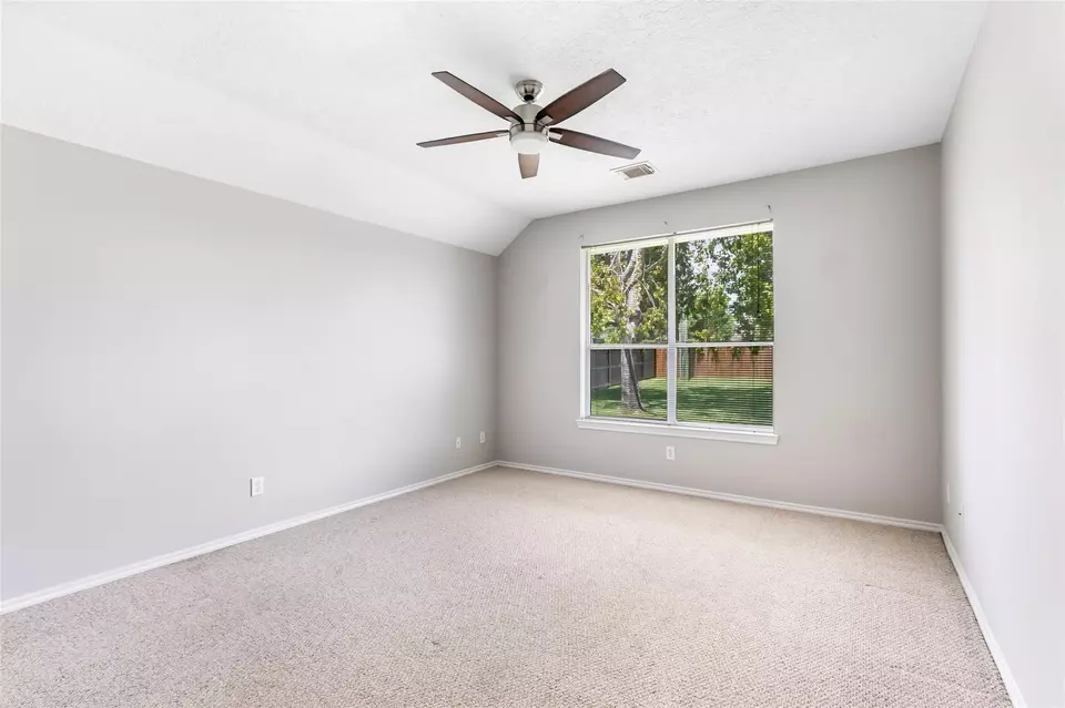 Bedroom - 7126 Leens Lodge Ln, Humble, TX 77346 photo 1 of 6