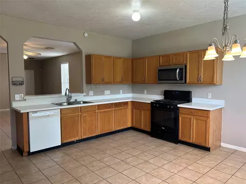 Kitchen - 24227 Pinecreek Pt, Spring, TX 77373 photo 2 of 2