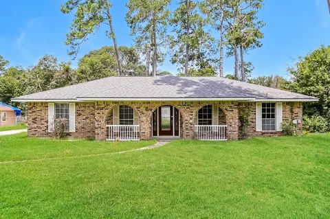 818 Coe Rd, Pinehurst, TX 77362 photo 1