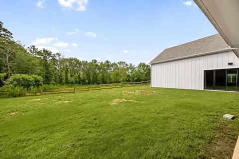 Exterior - 151 Quiet Springs Trl, Willis, TX 77378 photo 9 of 13