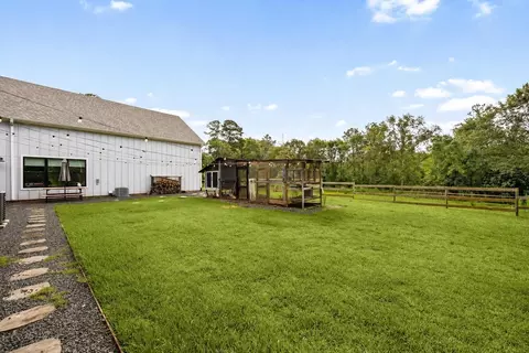 Exterior - 151 Quiet Springs Trl, Willis, TX 77378 photo 11 of 13