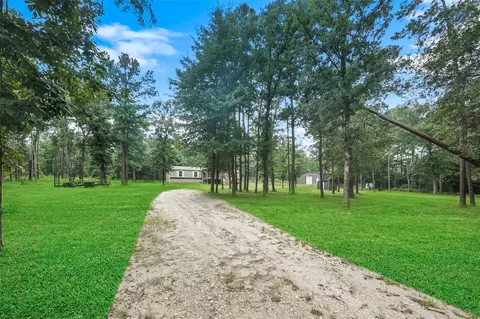 577 Winding River Rd, Oakhurst, TX 77359
