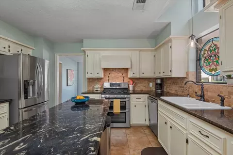 Kitchen - 10 Cape Chestnut Dr, Spring, TX 77381 photo 2 of 4