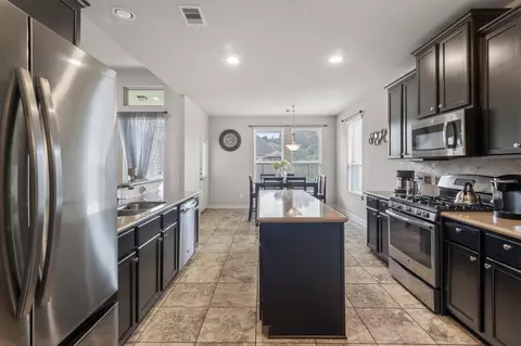 Kitchen - 24711 E Burnaby Cir, Spring, TX 77373 photo 2 of 2