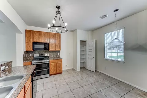 Kitchen - 4039 Mossy Spring Ln, Spring, TX 77388 photo 3 of 9