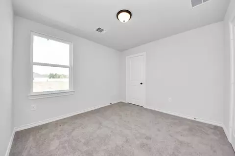 Bedroom - 25740 John Wayne Rd, Splendora, TX 77372 photo 11 of 14