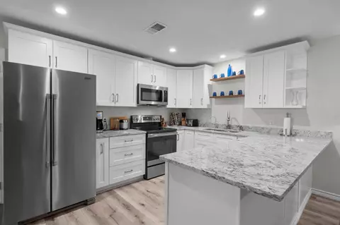 Kitchen - 209 Summit Dr, Conroe, TX 77303 photo 2 of 2