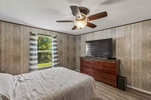 Bedroom - 152 E Oak Shadows, Onalaska, TX 77360 photo 1 of 2