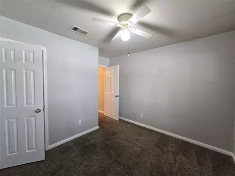 Bedroom - 10320 Stone Gate Dr, Conroe, TX 77385 photo 6 of 6