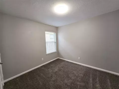 Bedroom - 10320 Stone Gate Dr, Conroe, TX 77385 photo 3 of 6