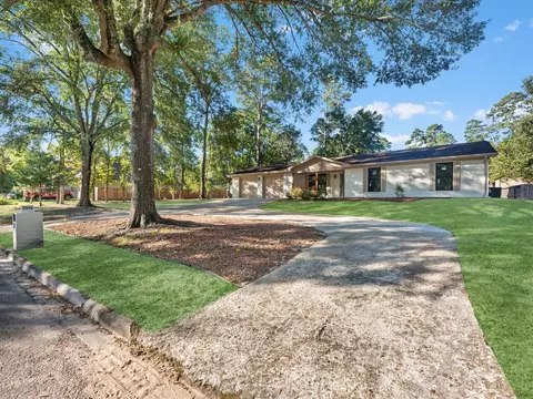 Exterior - 9096 N Comanche Cir, Willis, TX 77378 photo 3 of 9