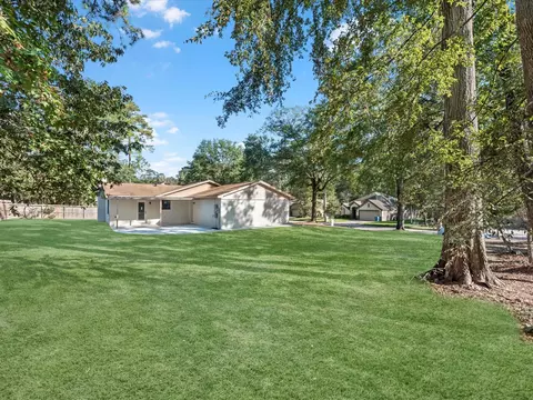 Exterior - 9096 N Comanche Cir, Willis, TX 77378 photo 7 of 9