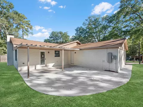 Exterior - 9096 N Comanche Cir, Willis, TX 77378 photo 5 of 9