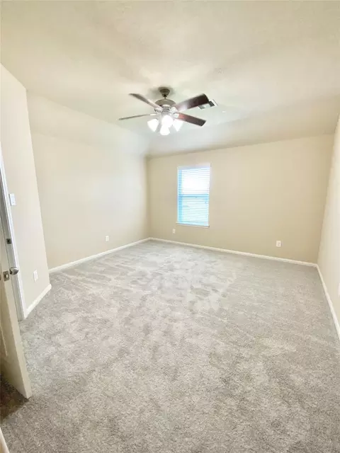 Bedroom - 21602 Royal Melbourne Ct, Porter, TX 77365 photo 7 of 7