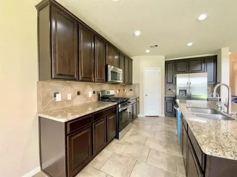 Kitchen - 21602 Royal Melbourne Ct, Porter, TX 77365 photo 2 of 3