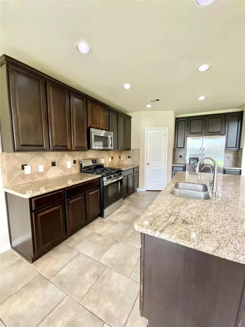 Kitchen - 21602 Royal Melbourne Ct, Porter, TX 77365 photo 1 of 3