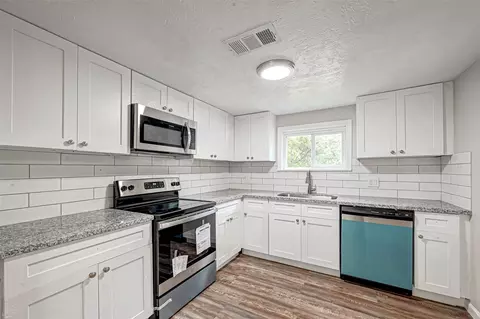 Kitchen - 10694 Pine St, Willis, TX 77318 photo 1 of 4