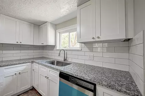 Kitchen - 10694 Pine St, Willis, TX 77318 photo 3 of 4