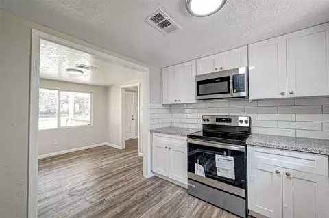Kitchen - 10694 Pine St, Willis, TX 77318 photo 4 of 4