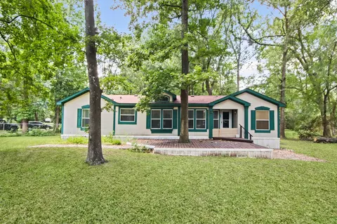 150 Sentinel Oaks, Pinehurst, TX 77362 photo 1