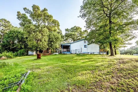 Exterior - 894 Winding Creek Dr, Trinity, TX 75862 photo 13 of 21