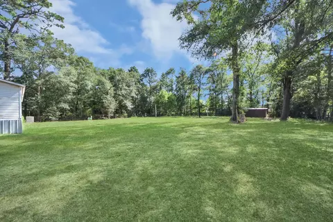 Exterior - 14009 Rustic Ln, Conroe, TX 77306 photo 8 of 10