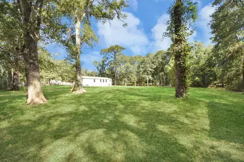 Exterior - 14009 Rustic Ln, Conroe, TX 77306 photo 7 of 10