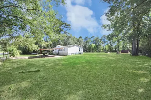 Exterior - 14009 Rustic Ln, Conroe, TX 77306 photo 9 of 10