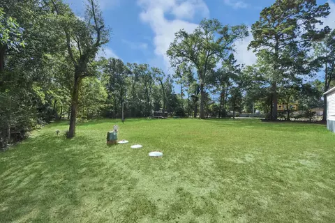 Exterior - 14009 Rustic Ln, Conroe, TX 77306 photo 4 of 10