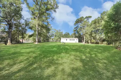 Exterior - 14009 Rustic Ln, Conroe, TX 77306 photo 6 of 10