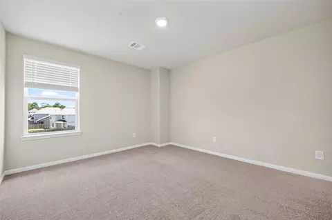 Bedroom - 13758 Goldeye Dr, Conroe, TX 77384 photo 10 of 16